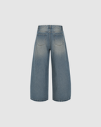 DISTRESSED BARREL LEG JEANS - BLUE