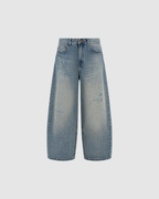 DISTRESSED BARREL LEG JEANS - BLUE